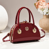 light glossy leather Gold Trimmed Structured Handbag Bag